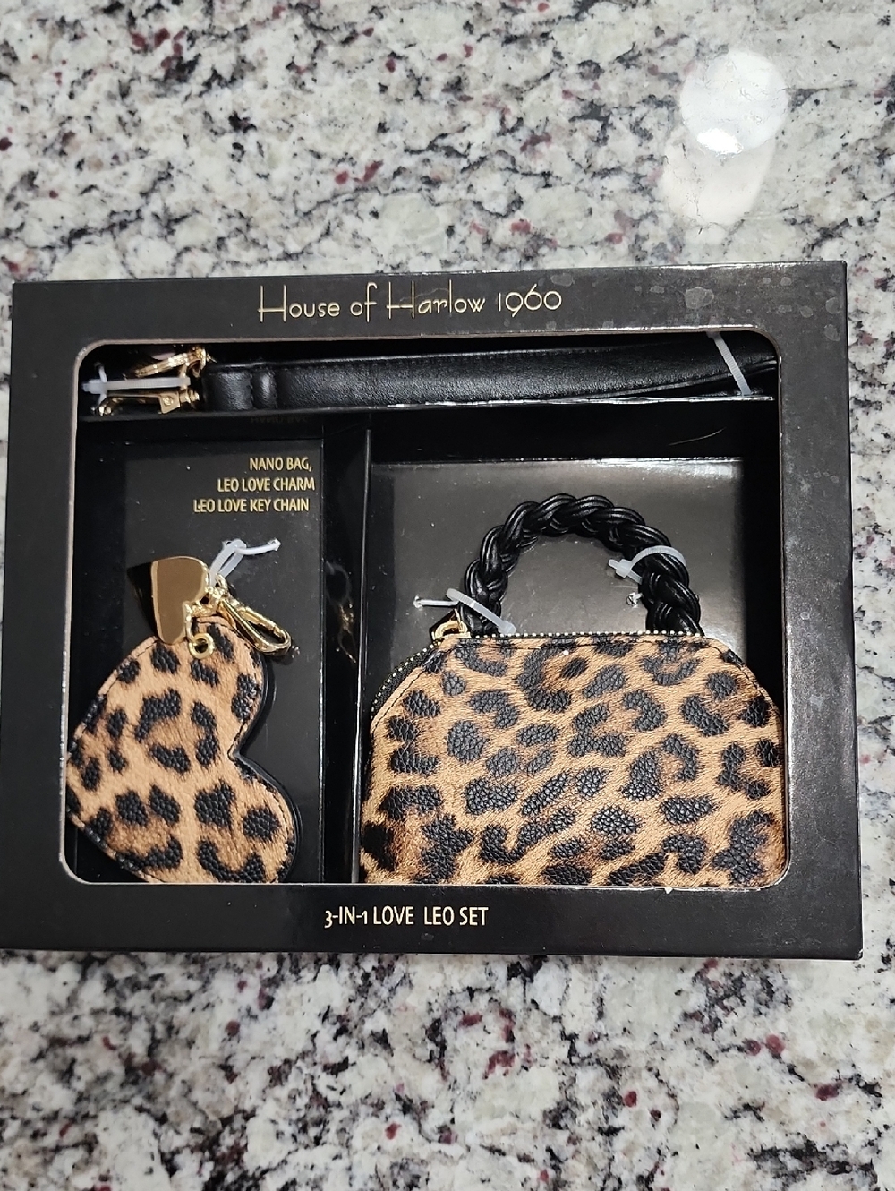 House of Harlow 1960 "3-in-1 Love Leo" set featuring a leopard print nano bag.